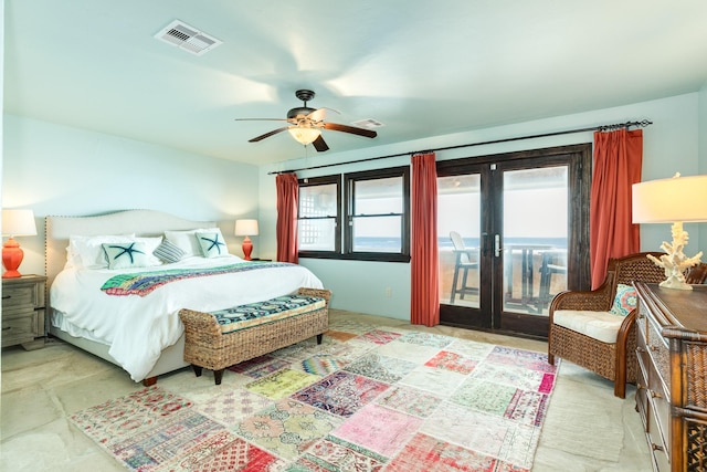 bedroom with access to exterior, french doors, and ceiling fan