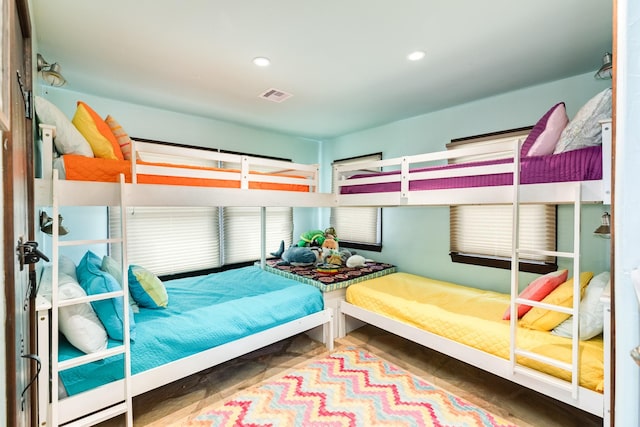 bedroom with wood-type flooring