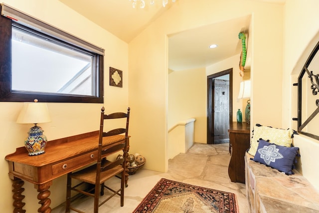 interior space featuring lofted ceiling