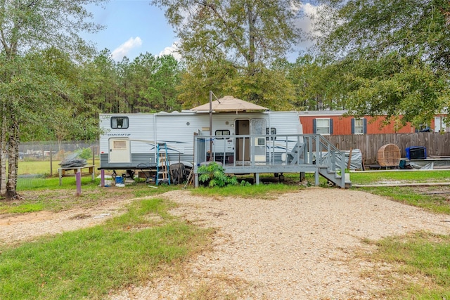 view of front of house with a deck