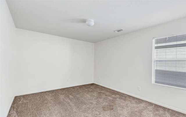 empty room with carpet floors