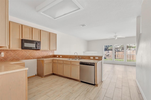 kitchen featuring dishwasher, sink, ceiling fan, light brown cabinetry, and light hardwood / wood-style floors