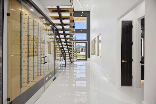 hall featuring tile patterned flooring