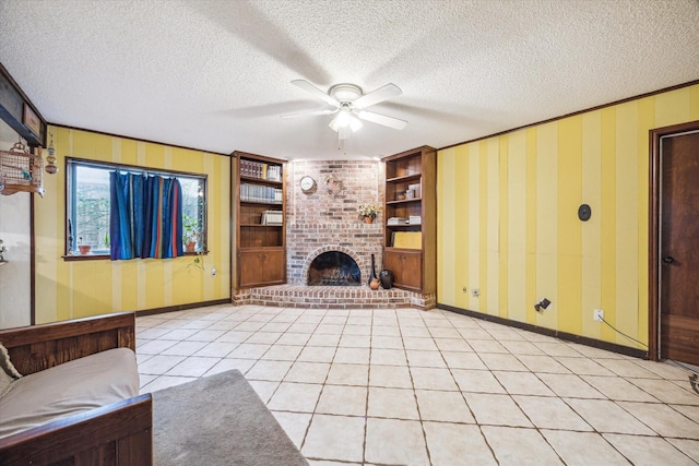 unfurnished living room featuring built in shelves, a textured ceiling, ceiling fan, and light tile patterned flooring