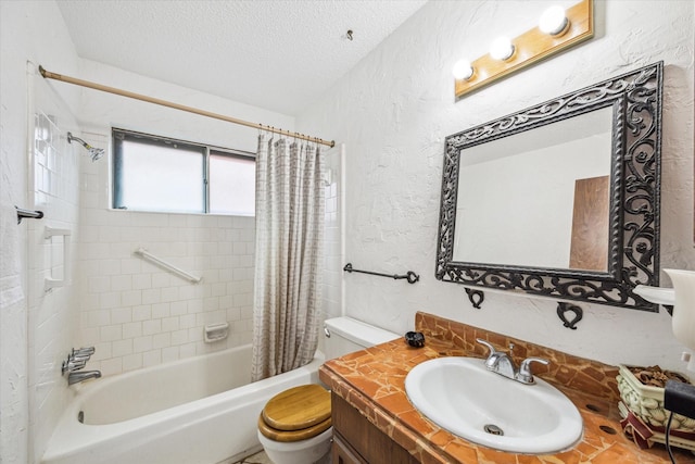 full bathroom featuring vanity, shower / bath combination with curtain, a textured ceiling, and toilet