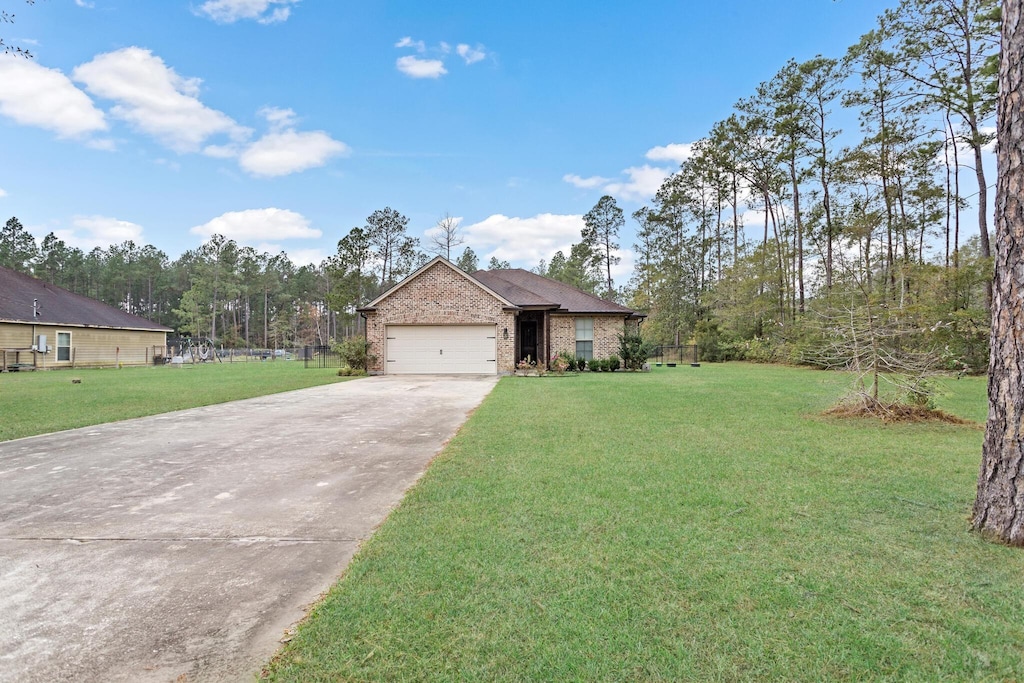 single story home with a front lawn and a garage