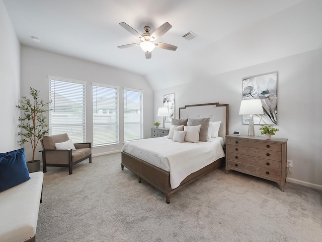 carpeted bedroom featuring ceiling fan and lofted ceiling