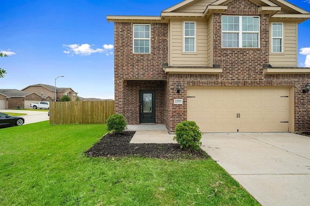 view of front facade with a front lawn and a garage