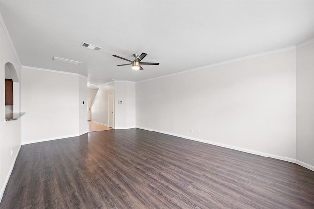 unfurnished living room featuring dark hardwood / wood-style floors, ceiling fan, and ornamental molding