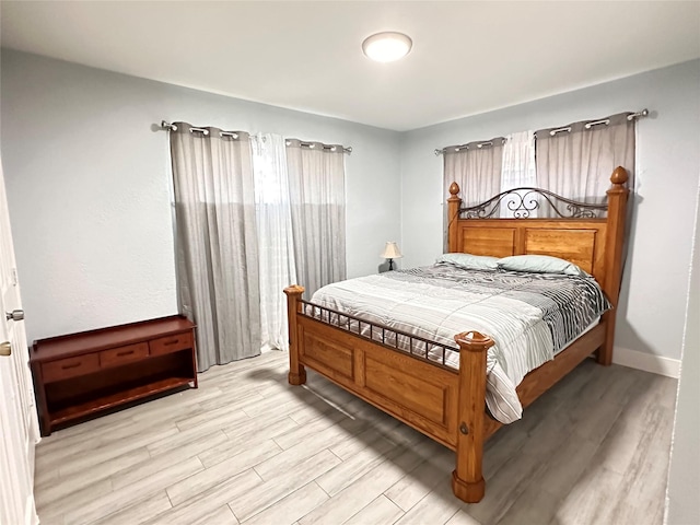 bedroom with light hardwood / wood-style flooring