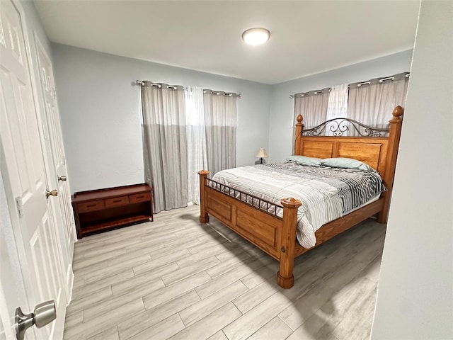 bedroom featuring light wood-type flooring