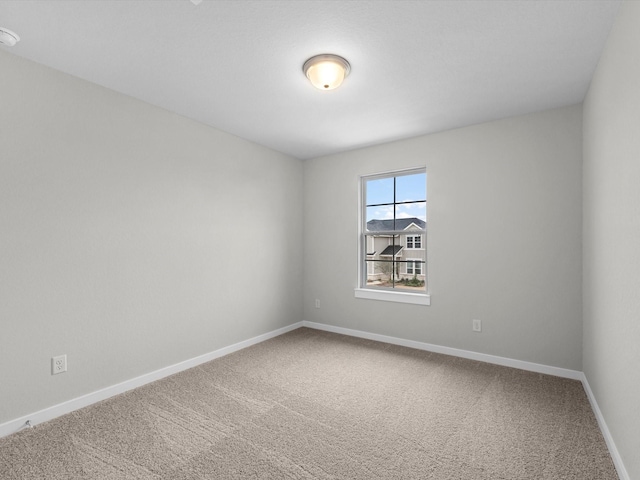 spare room featuring carpet flooring