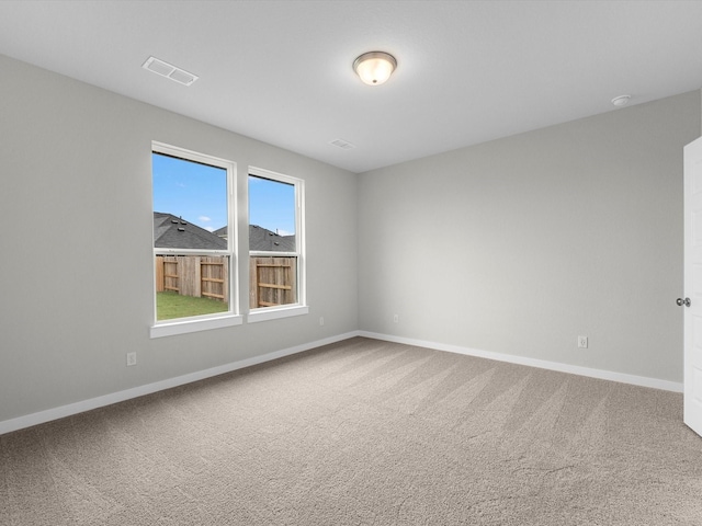 empty room with carpet flooring