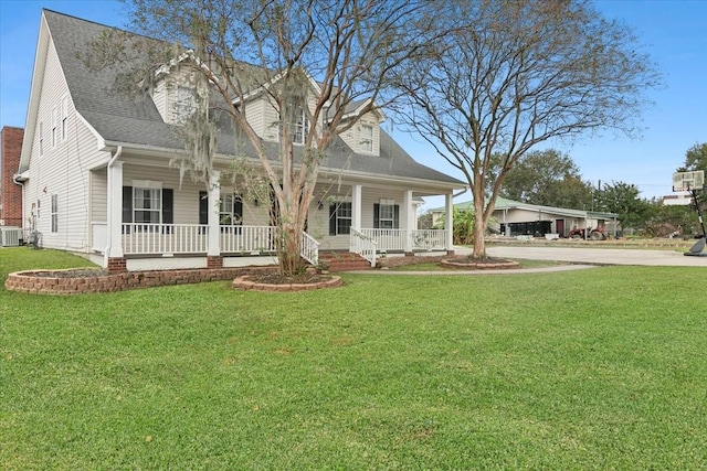 view of front of property featuring central AC, a porch, and a front yard