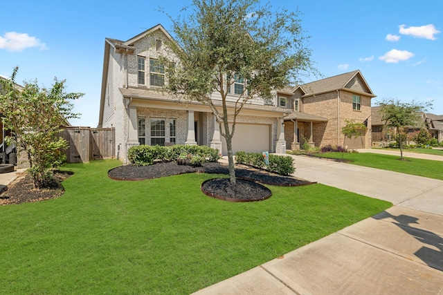 view of front of home with a garage and a front yard