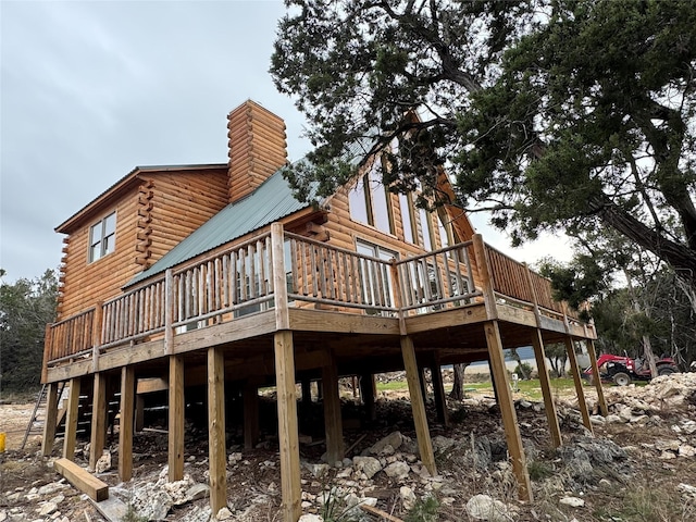 rear view of property with a deck