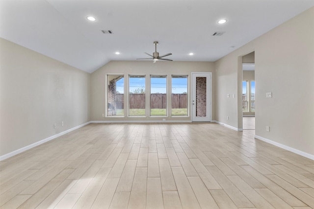 unfurnished living room featuring ceiling fan, light hardwood / wood-style flooring, and lofted ceiling