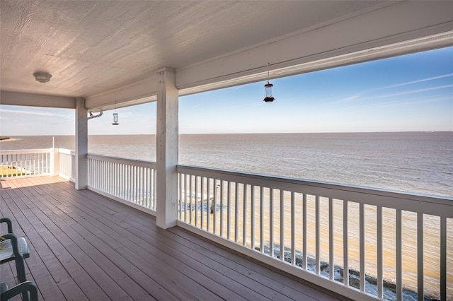 deck featuring a water view