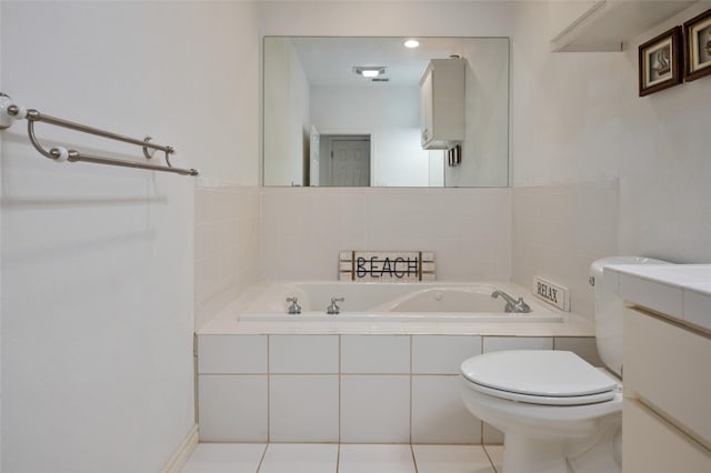 bathroom with tile patterned floors, vanity, tiled bath, and toilet