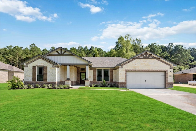 1485 Rd 66114, Dayton, TX 77535 - craftsman-style home with a front yard, an attached garage, concrete driveway, and stone siding