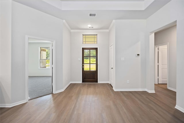 1485 Rd 66114, Dayton, TX 77535 - foyer entrance with wood finished floors, baseboards, and crown molding