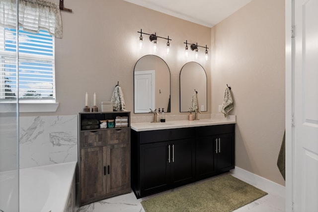 bathroom featuring vanity and a tub to relax in