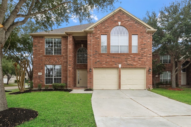 view of front facade featuring a front yard and a garage