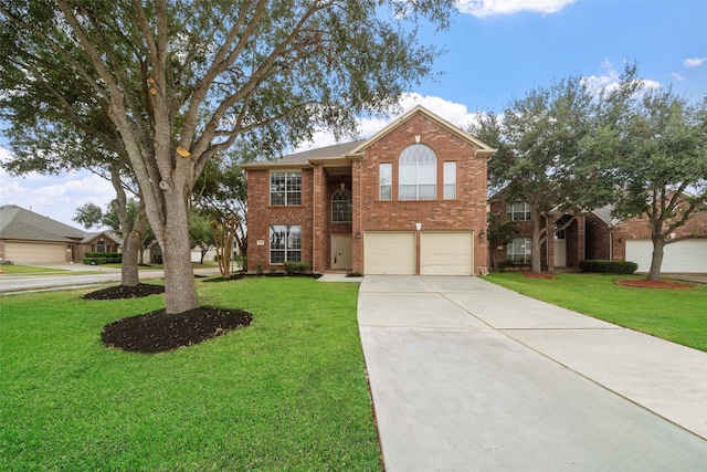 view of front of property with a front lawn and a garage