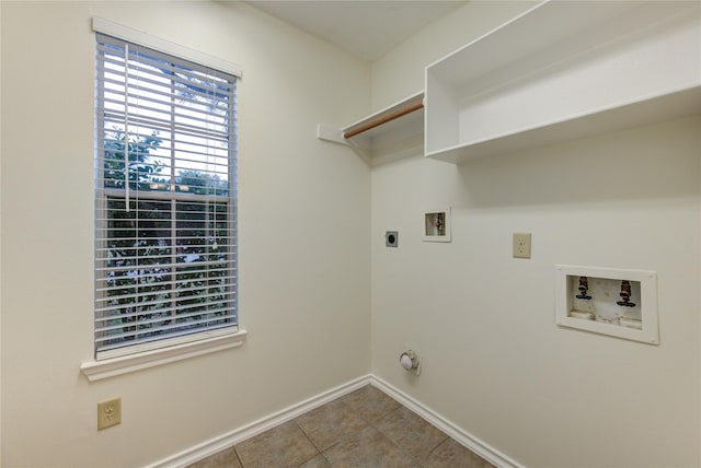 washroom with hookup for an electric dryer, tile patterned flooring, and washer hookup