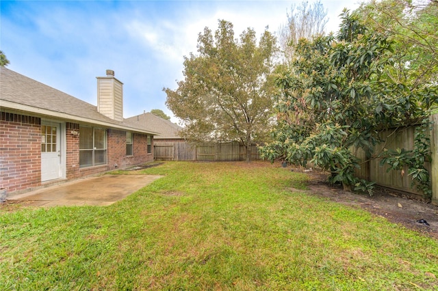 view of yard with a patio