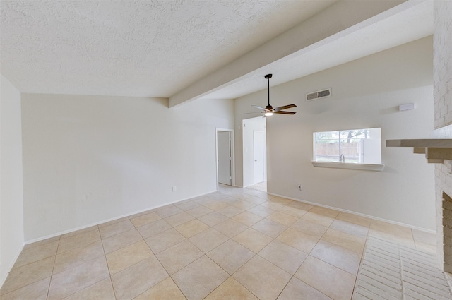 unfurnished living room with vaulted ceiling with beams, ceiling fan, light tile patterned floors, and a brick fireplace