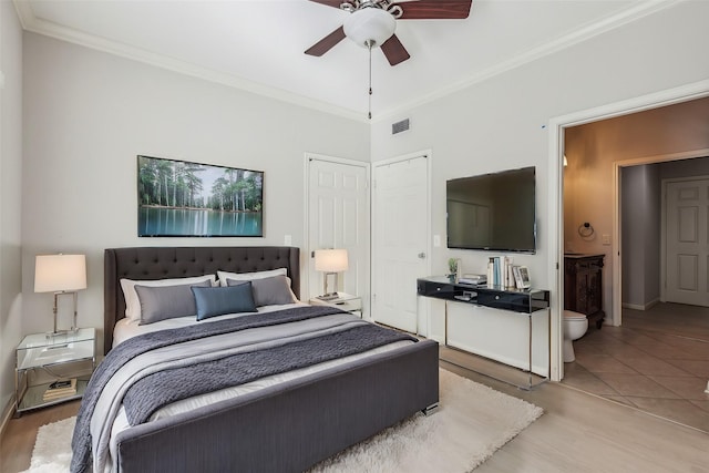 bedroom featuring ceiling fan, light hardwood / wood-style floors, and ornamental molding