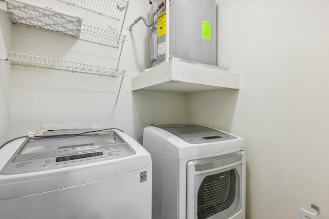 laundry area with separate washer and dryer