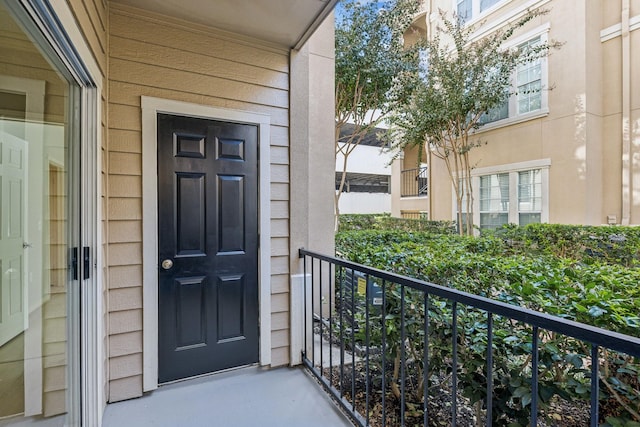 doorway to property with a balcony