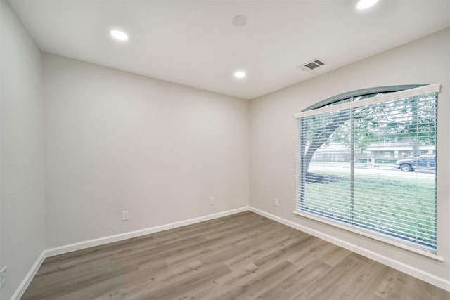 empty room featuring wood-type flooring