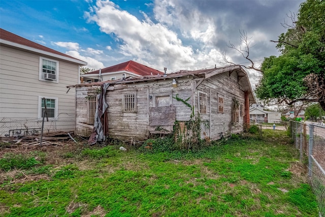 view of property exterior featuring a yard