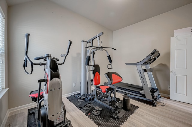 exercise area featuring hardwood / wood-style floors