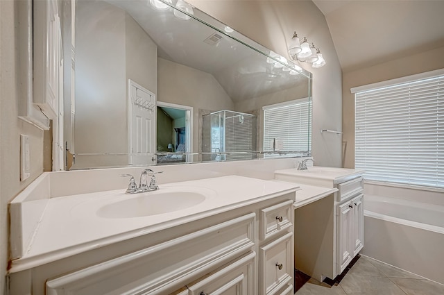 bathroom featuring vanity, separate shower and tub, tile patterned floors, and lofted ceiling