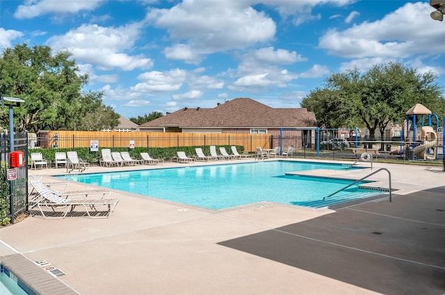 view of swimming pool with a patio