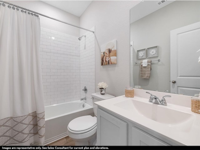 full bathroom featuring vanity, toilet, and shower / tub combo with curtain