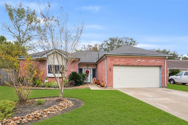 ranch-style home with a front yard and a garage