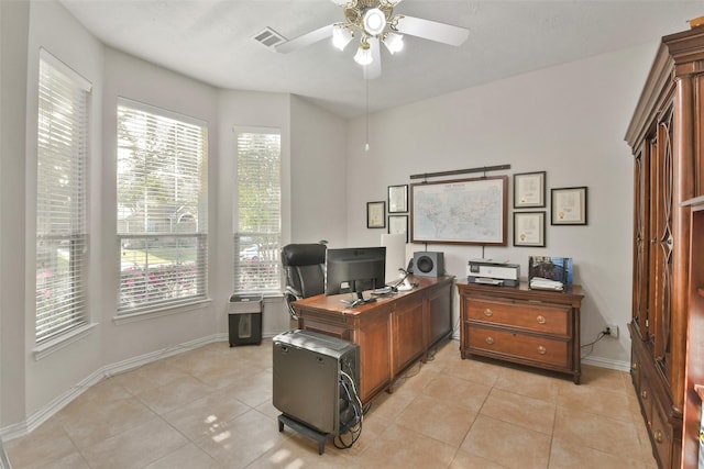 office space featuring light tile patterned floors and ceiling fan