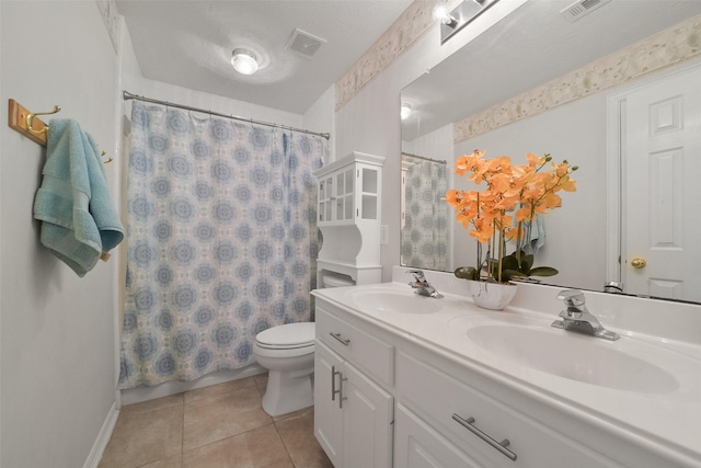 bathroom with vanity, tile patterned floors, toilet, and a shower with shower curtain