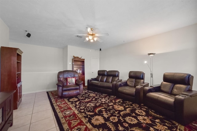 living room featuring light tile patterned floors and ceiling fan