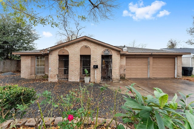 ranch-style home with a garage