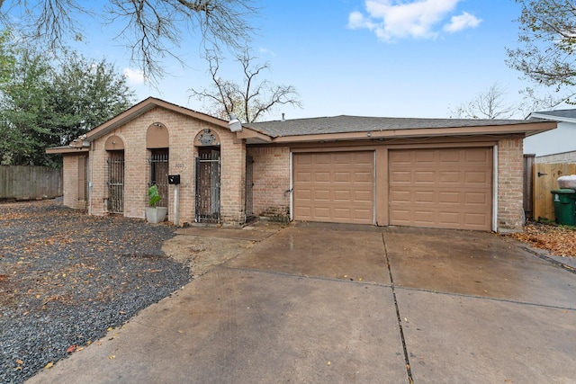 single story home featuring a garage