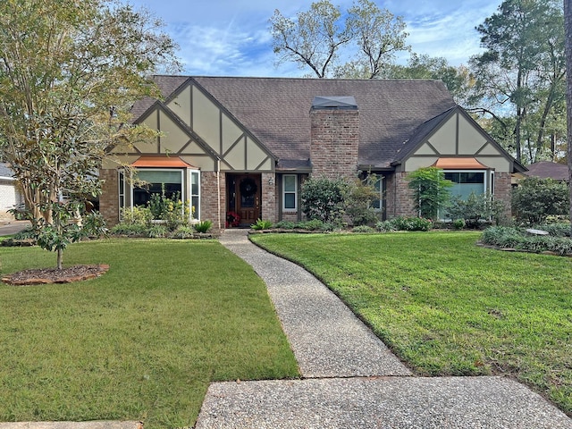 tudor house with a front yard