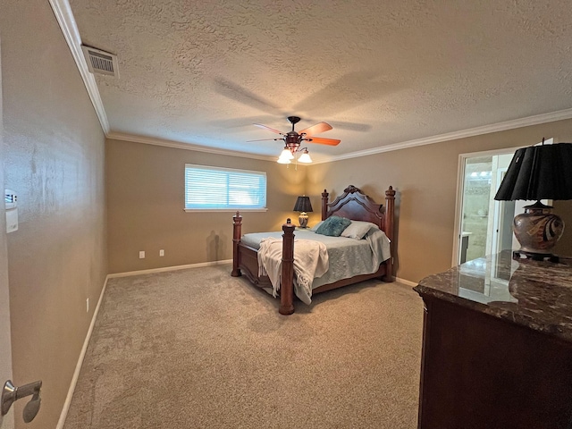 bedroom featuring light carpet, ensuite bath, ornamental molding, a textured ceiling, and ceiling fan