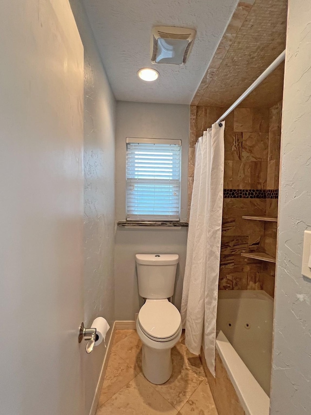 bathroom with tile patterned flooring, shower / bath combo, a textured ceiling, and toilet