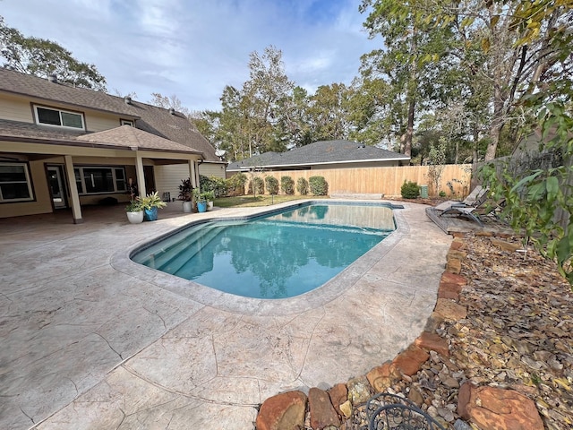 view of pool featuring a patio